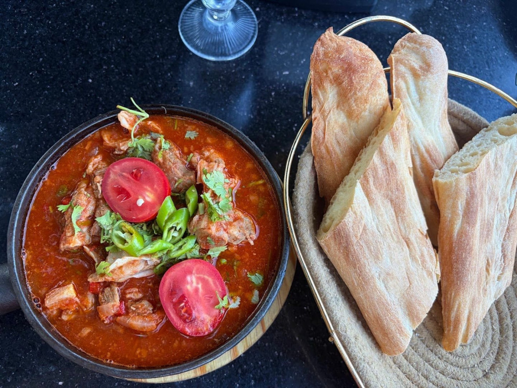 A Georgian dish with shoti bread at Kapiloni