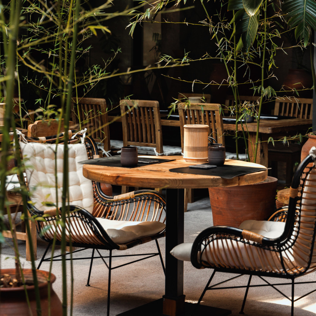 Tables and plants at Khedi Sushi Bar