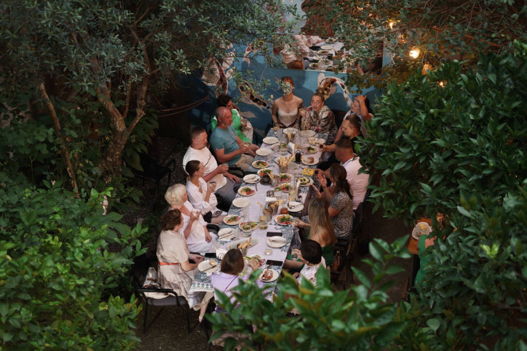 A table set in Sakhli’s leafy courtyard