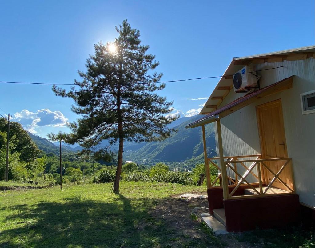 Cottage green field in Racha